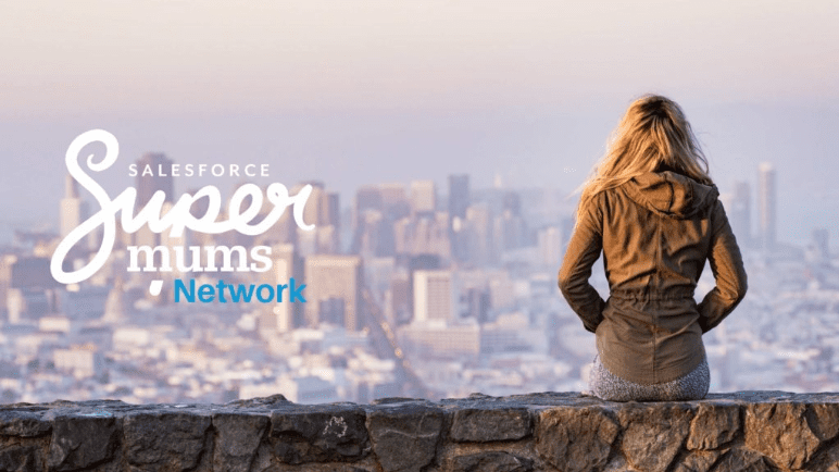 Photo: SuperMums logo with woman looking at a city skyline in the distance.