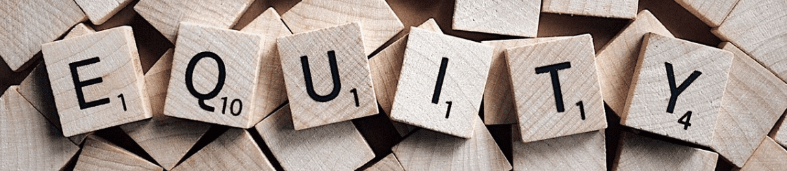 Scrabble tiles spelling equity.